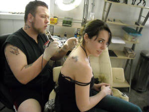 brianygettingtattoosmiling.jpg