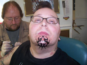 forrightarmwhileshowingoffmynewjesterchintattoo.jp